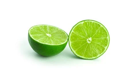 Limes on a white background. Stock Photos
