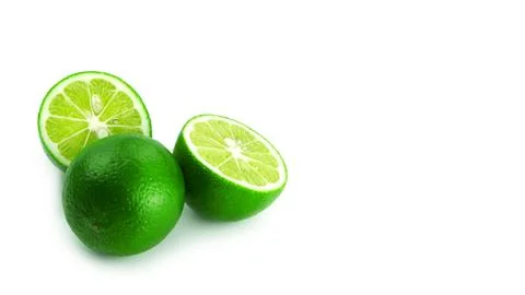 Limes on a white background. Stock Photos