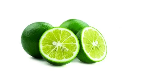 Limes on a white background. Stock Photos
