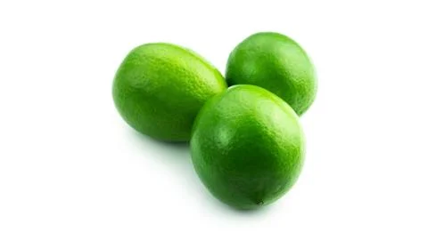 Limes on a white background. Stock Photos