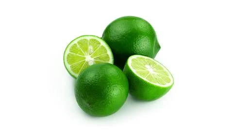 Limes on a white background. Stock Photos