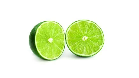 Limes on a white background. Stock Photos