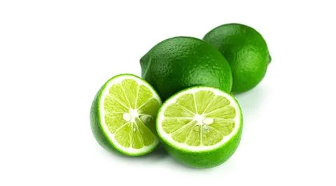 Limes on a white background. Stock Photos