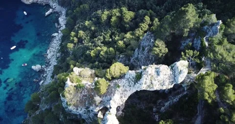 Arco Naturale“ is a natural limestone arch that forms a bridge between two  pillars of rock.