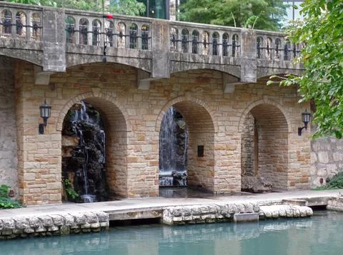 Limestone Arches in front of a Waterfall Stock Photos