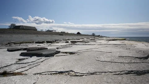 Limestone beach at Neptune's fields, Oland island, Sweden, Low Angle Pan Stock Footage 208834702