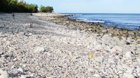Limestone beach with pebbles Stock Footage 56724289