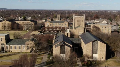 Limestone campus chapel and Gothic tower in Tulsa Oklahoma Stock Footage 121113771