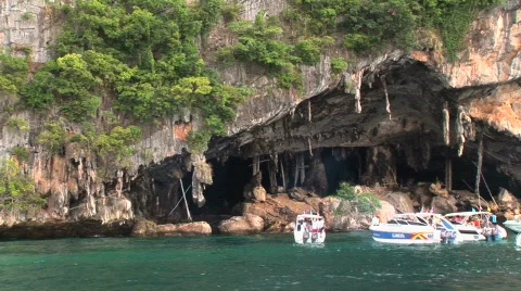 Limestone cave with boats Stock Footage 295998