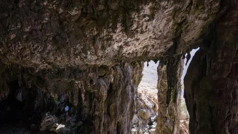 Limestone cave interior with bright desert opening. Degub Cave, Sokotra Yemen Stock Photos