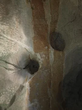 A limestone cave interior with stalactites and flowstone, Thailand Stock Photos