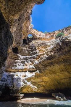Limestone cave, open sky view on the Algarve, Portugal Stock Photos