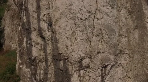 A limestone cliff side detail flight Video stock 63782657