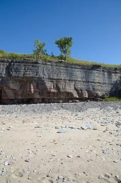 Limestone cliffs at the beach Stock Photos