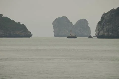 Limestone cliffs in Lan Ha Bay. Stock Photos