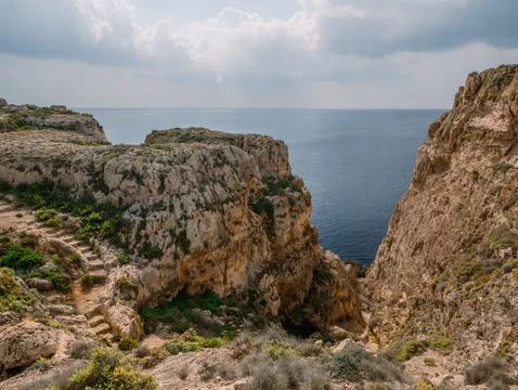 Limestone cliffs of Malta overlooking the sparkling Mediterranean Seasky Stock Photos