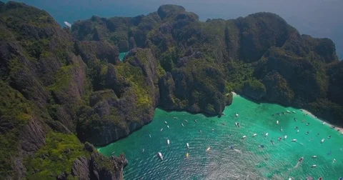 Limestone Cliffs of Maya Bay, Phi Phi Islands, Thailand, High Aerial Shot Video stock 73584594