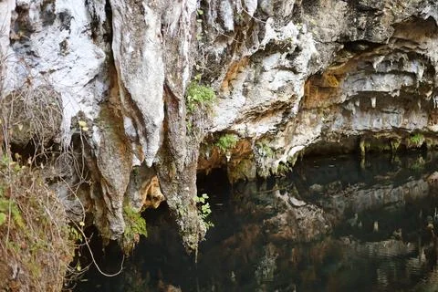 Limestone formations above water Stock Photos