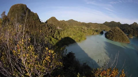 Limestone Islands and Remote Lagoon Stock Footage 55993564