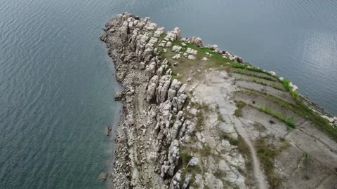 Limestone land in the middle of the lake 스톡 동영상 271114791