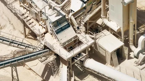 Limestone quarry operations and aggregate processing in industrial complex Stock Footage 336582757