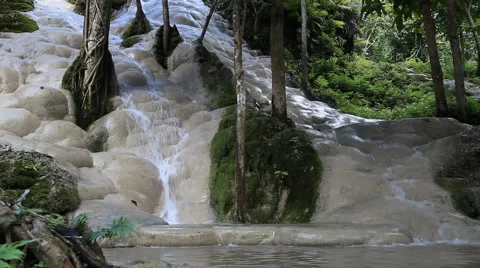 Limestone waterfall at Buatong waterfall forest park Thailand Stock Footage 44750463