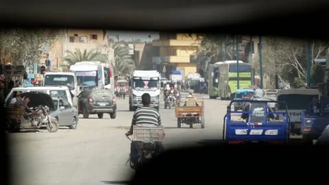 Limited View From The Car Driving Down The Street Of A Middle Eastern Town Stock Footage 234458596