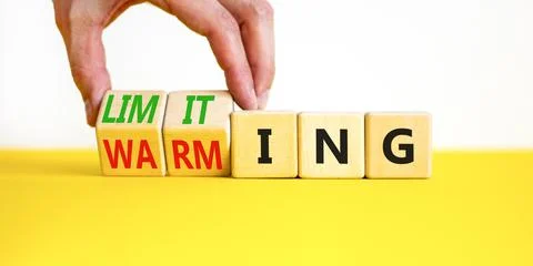 Limiting global warming symbol. Concept words Limiting and Warming on wooden  스톡 사진