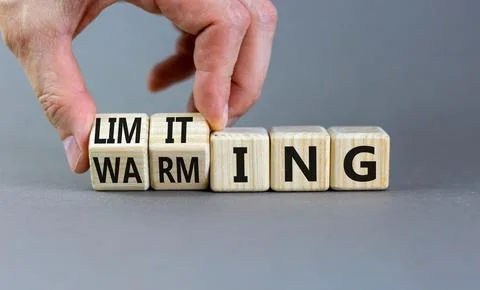 Limiting global warming symbol. Concept words Limiting and Warming on wooden  스톡 사진