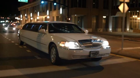 Limo limousine city night driving Stock Footage