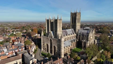 Lincoln Cathedral UK pull back drone aerial reverse reveal Stock Footage 293244725