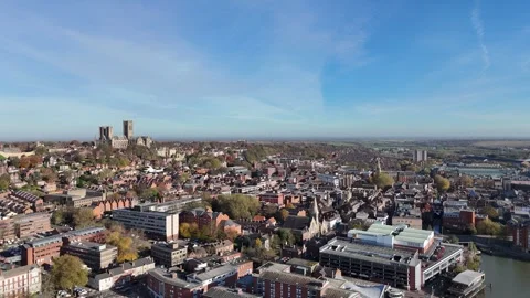 Lincoln England reverse drone aerial of city centre Stock Footage 293244652