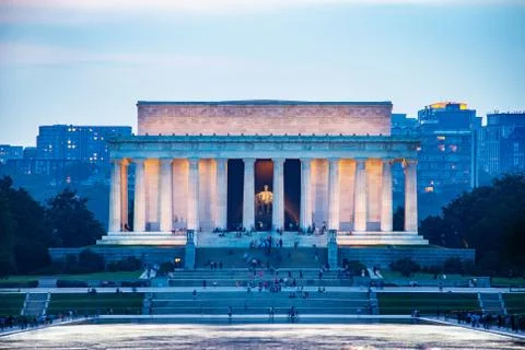 Lincoln memorial reflected on the reflection pool when dusk at nation mall. Stock Photos