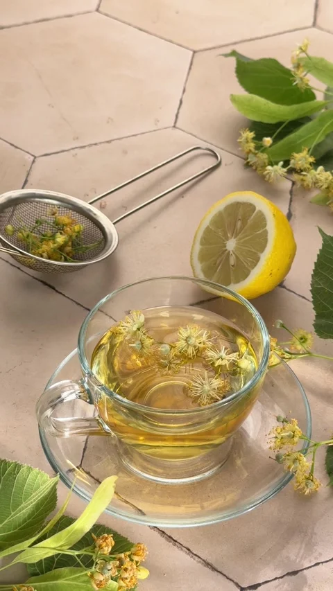 Linden flower tea infusing in a cup Stock Footage 340193632