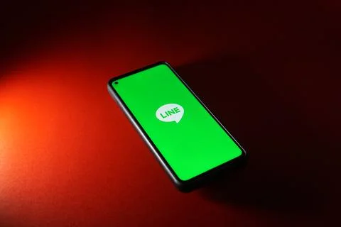 Line application logo on smartphone android system. Stock Photos