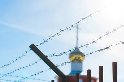 Line barbed wire. focus with shallow depth of field. close-up Stock Photos