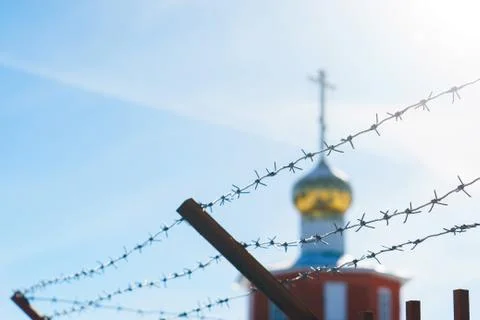 Line barbed wire. focus with shallow depth of field. close-up Stock Photos