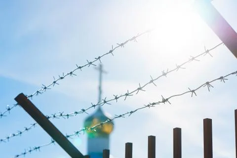 Line barbed wire. focus with shallow depth of field. close-up Stock Photos