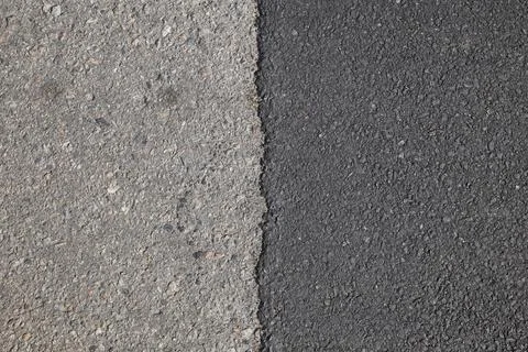 Line between old and new asphalt on the road Stock Photos