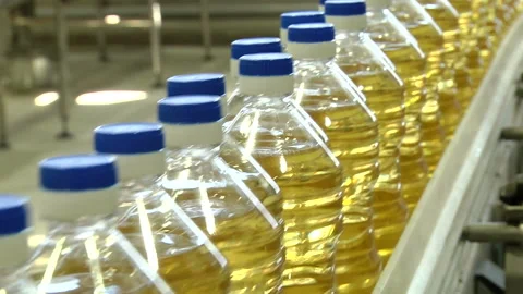 The line for bottling of vegetable oils Stock Footage 106470490