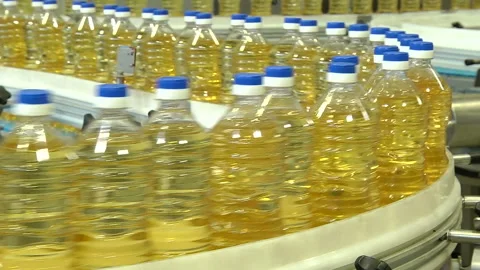 The line for bottling of vegetable oils Stock Footage 106471052