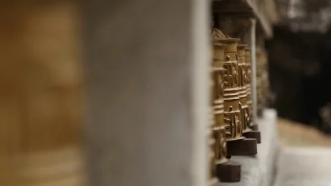 Line of Buddhist prayer wheels tracking Vídeo Stock 101443356