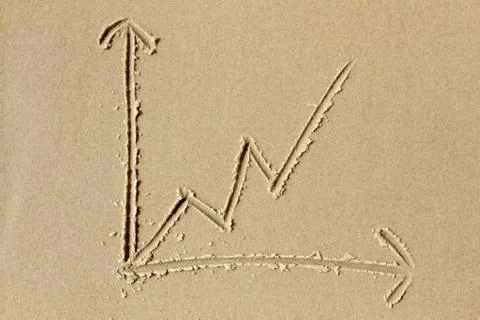 Line chart drawn in the sand Stock Photos