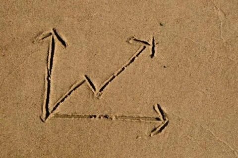 Line chart drawn in sand Stock Photos