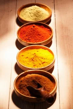 Line of colourful ground spice Stock Photos