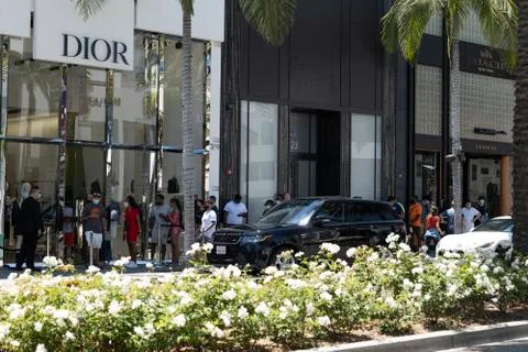 Line of customers at Dior Stock Photos