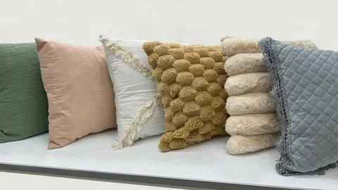 Line of decorative throw pillows Stock Photos