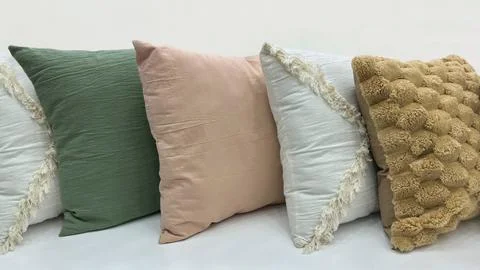 Line of decorative throw pillows Stock Photos