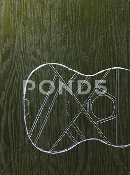 A line drawing image on a natural wood grain background. the sound board and Stock Illustration