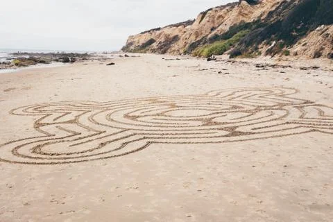 Line drawing pattern drawn onto beach sand, Crystal Cove State Park, Laguna Stock Photos